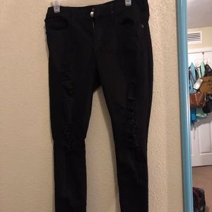 Distressed cropped black express jeans